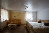 Schlafzimmer mit Wohnecke